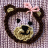 Bear with hair bow